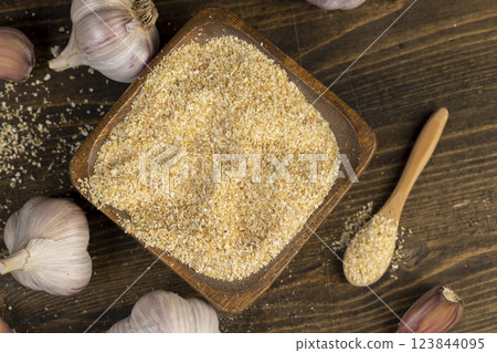 dried crushed garlic fruits for cooking dried crushed garlic fruits for cooking 123844095