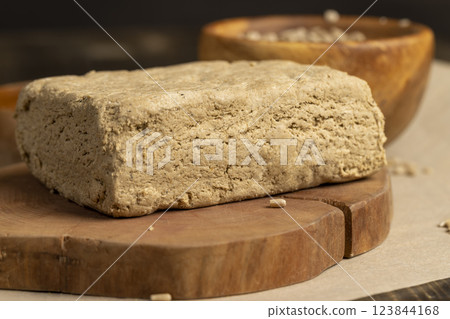 halva made from roasted sunflower seeds and crushed into one solid mass halva made from roasted sunflower seeds and crushed into one solid mass 123844168