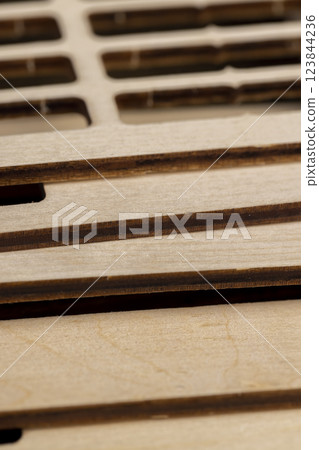 thin wooden plywood for sawing out various objects 123844236