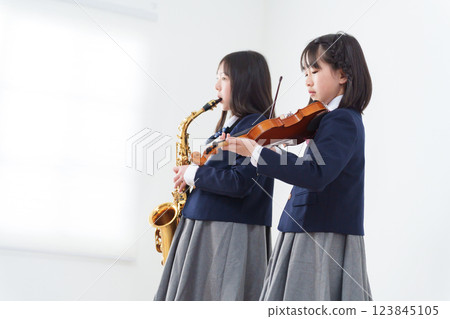 Students playing musical instruments Students playing musical instruments 123845105