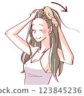 Woman taking care of her hair 3 123845236
