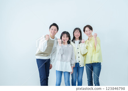 Parents and children doing a fist pump Family Parents and children doing a fist pump Family 123846798