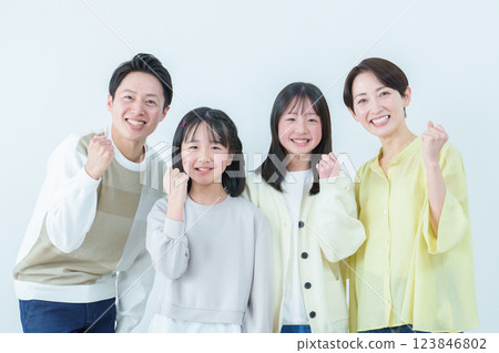 Parents and children doing a fist pump Family Parents and children doing a fist pump Family 123846802
