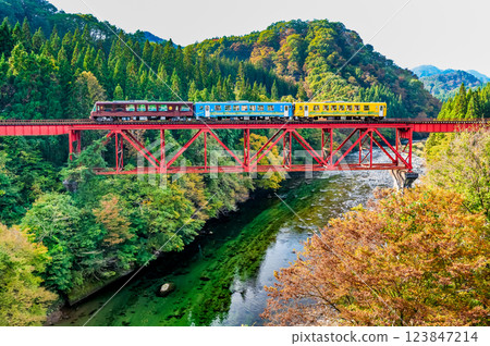 Akita Inland Railway: A train crossing the Omata River Bridge Akita Inland Railway: A train crossing the Omata River Bridge 123847214