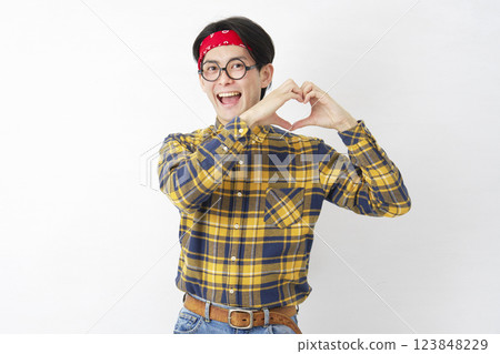 Akihabara male heart gesture white background 123848229