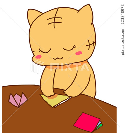 Cat making origami 123848978