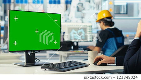 Photovoltaics factory worker analyzing data on green screen PC, reviewing system metrics. Solar panels manufacturing plant employee troubleshooting technical issues using chroma key computer, camera B 123849024