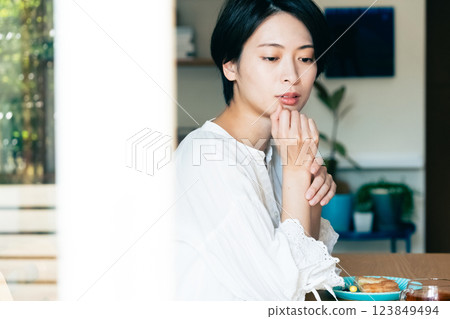 Woman thinking in the living room 123849494