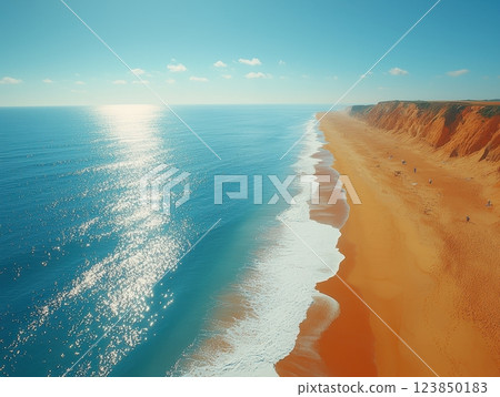 Sunrise Over Serene Beach with Golden Sand and Gentle Waves 123850183