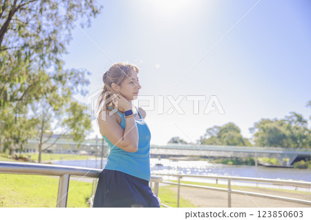 Relaxed sporty woman Relaxed sporty woman 123850603