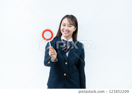 Girls high school student with a circle plate 123852209