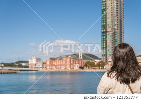 [Kitakyushu Mojiko Retro Mojiko Retro High Mart and a woman] 123853777