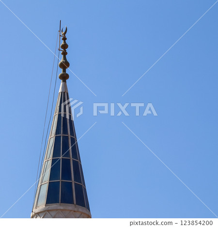 Mosque Minaret on a background of blue sky in Bitez, Bodrum, Turkiye 123854200