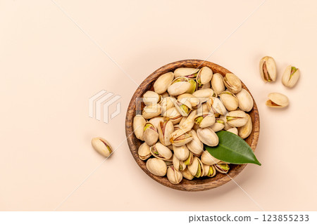 Fresh pistachios, showcasing their vibrant green color and unique texture 123855233