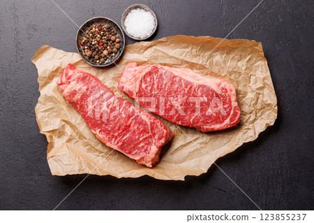 Raw marbled striploin steak, fresh, rich, ready for cooking 123855237