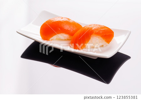 Salmon sushi beautifully arranged on plate 123855381