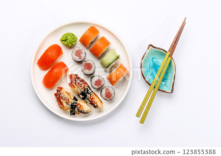 Assorted sushi and maki rolls beautifully arranged on plate 123855388