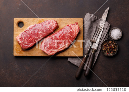Raw marbled striploin steak, fresh, rich, ready for cooking 123855518