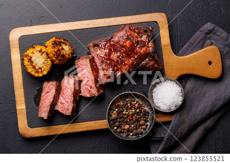 A perfectly cooked sliced striploin steak with a juicy, tender texture 123855521