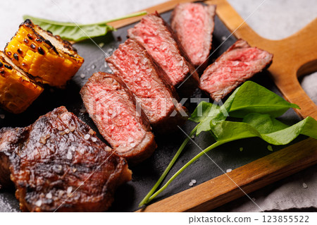 A perfectly cooked sliced striploin steak with a juicy, tender texture 123855522