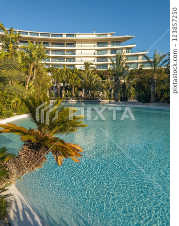 Outdoor swimming pool in a tropical luxury hotel resort 123857250