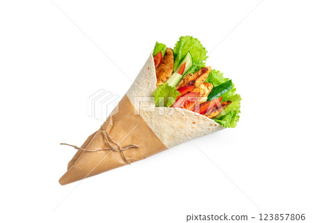 Grilled chicken wrap with fresh lettuce, tomatoes and cucumber in tortilla Grilled chicken wrap with fresh lettuce, tomatoes and cucumber in tortilla 123857806