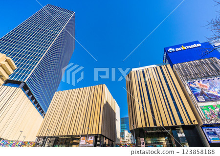 Tokyo cityscape, Japan, February 11th (bustling) A view of Hareza Ikebukuro, Animate, and other stores at the east exit of Ikebukuro Station against the blue sky Tokyo cityscape, Japan, February 11th (bustling) A view of Hareza Ikebukuro, Animate, and other stores at the east exit of Ikebukuro Station against the blue sky 123858188