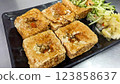 A plate of golden fried Taiwanese stinky tofu 123858637