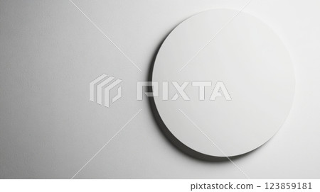 White Round Lid on Gray Surface 123859181