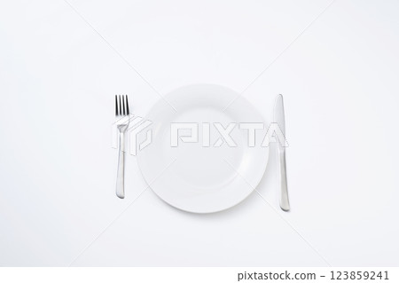 Simple white plate, fork and knife Simple white plate, fork and knife 123859241
