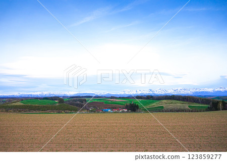 Spring landscape of Biei, Hokkaido with hills and strange cloud shapes 123859277