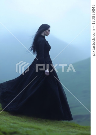 Woman in Black Gown on Hill 123859843