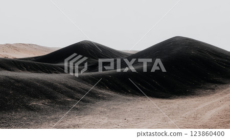 Dark hills in raw landscape 123860400