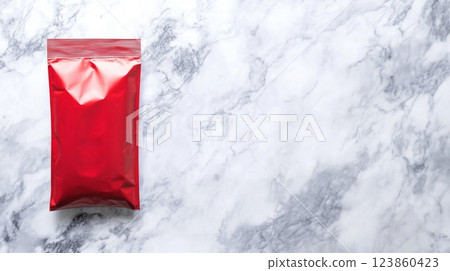 Shiny Red Stand Up Pouch on Marble Surface 123860423