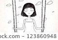 Depressed young woman holding chains of a swing under a cloudy sky 123860948
