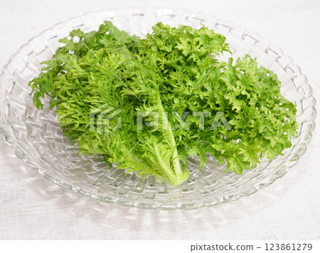 Organic wasabina leaves in glass bowl. Organic wasabina leaves in glass bowl. 123861279