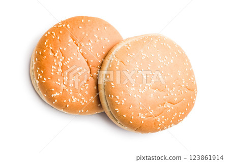 Empty burger bun with sesame seeds isolated on white background. 123861914