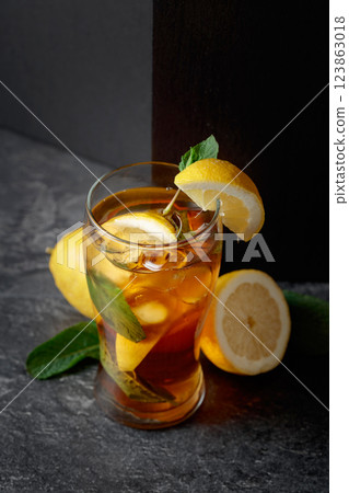 Hard seltzer with ice, mint, and lemon. 123863018