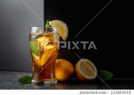 Hard seltzer or a summer refreshing drink with ice, mint, and lemon. 123863019
