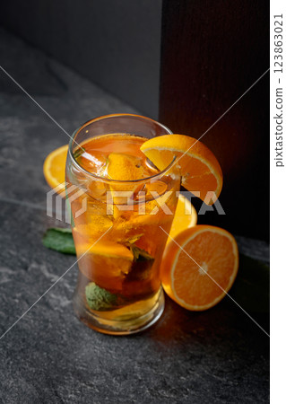 Hard seltzer with ice, mint, and orange. Hard seltzer with ice, mint, and orange. 123863021