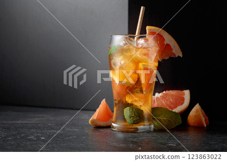 Hard seltzer or a summer refreshing drink with ice, mint, and grapefruit. 123863022