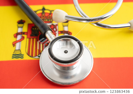 Stethoscope on Spain flag, business and finance. Stethoscope on Spain flag, business and finance. 123863436