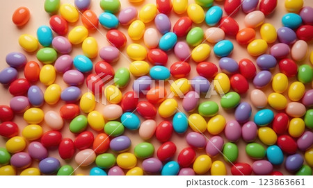 Colorful candy beans scattered across a flat surface during a festive celebration 123863661