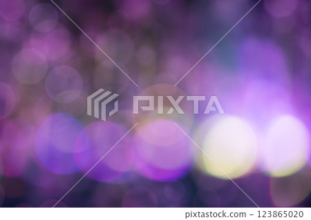 A blurry purple background with a few white circles 123865020