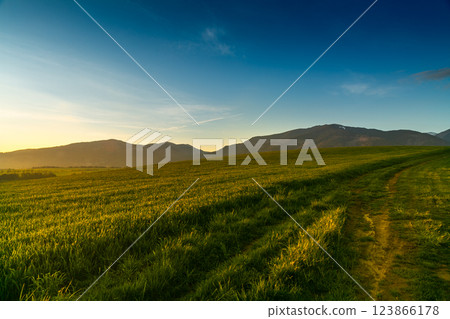Liptov - region of Slovakia. Sunset over Liptov in the background with Liptovska Mara and the Western Tatras around. Slovakia Liptov - region of Slovakia. Sunset over Liptov in the background with Liptovska Mara and the Western Tatras around. Slovakia 123866178