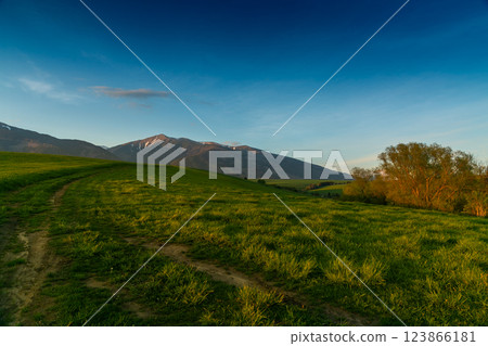 Liptov - region of Slovakia. Sunset over Liptov in the background with Liptovska Mara and the Western Tatras around. Slovakia Liptov - region of Slovakia. Sunset over Liptov in the background with Liptovska Mara and the Western Tatras around. Slovakia 123866181