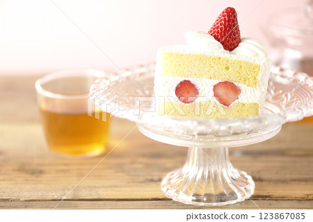 Strawberry shortcake on a cake stand and tea 123867085