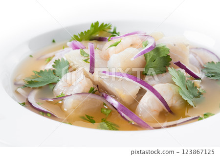 Traditional Peruvian ceviche sea bass fillet isolated on white background 123867125