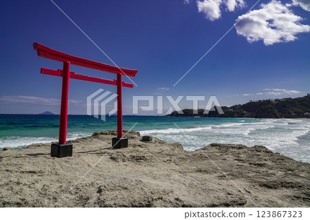 Beautiful coastal scenery with torii gates Beautiful coastal scenery with torii gates 123867323