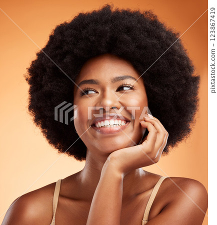 Beauty, black woman and happy wellness, aesthetic or natural makeup, glowing skincare and clean cosmetics on orange studio background. Smile young female model face, afro hair or thinking inspiration Beauty, black woman and happy wellness, aesthetic or natural makeup, glowing skincare and clean cosmetics on orange studio background. Smile young female model face, afro hair or thinking inspiration 123867419